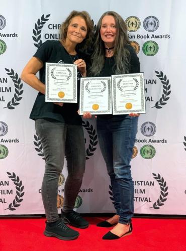 Christian Film Festival (CFF) August 2022 awards Best Music Video & best Song. Lynnmarie Hinerman & Tammy Thompson